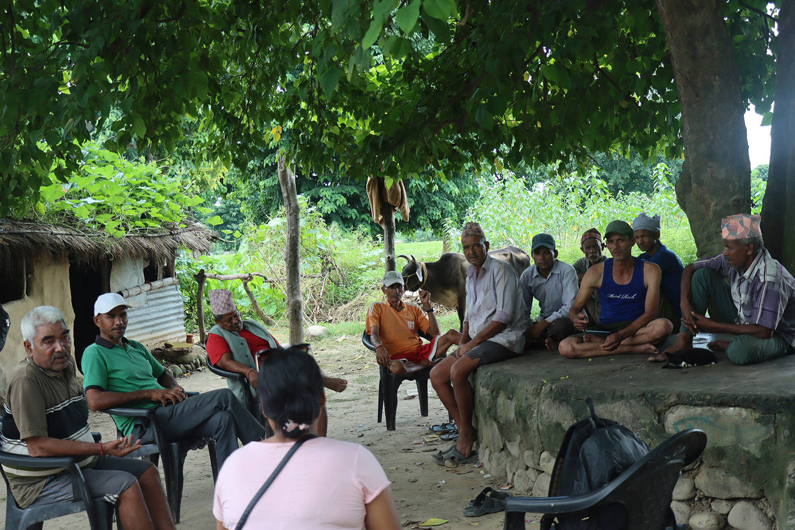 Residents of Dhakka Camp discussing their grievances.